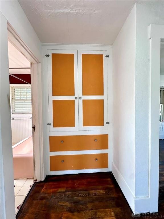 hall featuring dark hardwood / wood-style floors