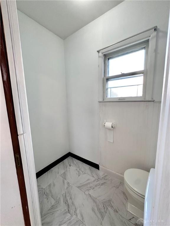 bathroom featuring toilet