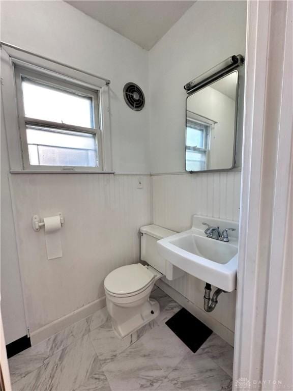 bathroom with toilet and sink