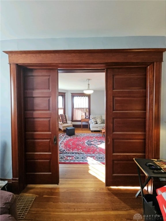 hall featuring dark hardwood / wood-style floors