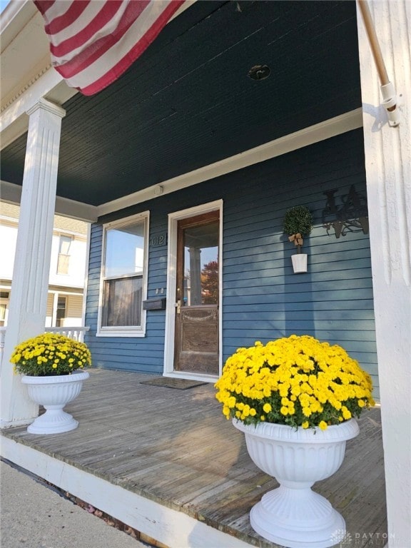 doorway to property featuring a porch