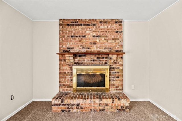 room details with carpet floors, baseboards, and a fireplace