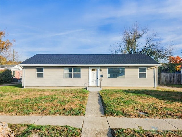 ranch-style house with a front yard