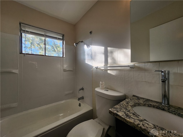 full bathroom with toilet, shower / tub combination, vanity, and tile walls