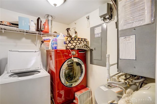 washroom with electric panel and independent washer and dryer