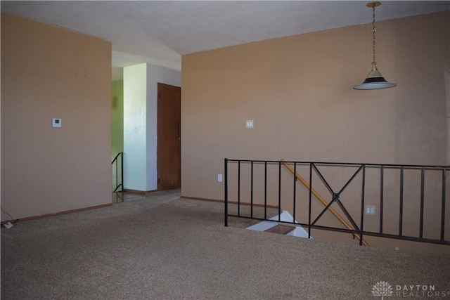 empty room featuring carpet floors