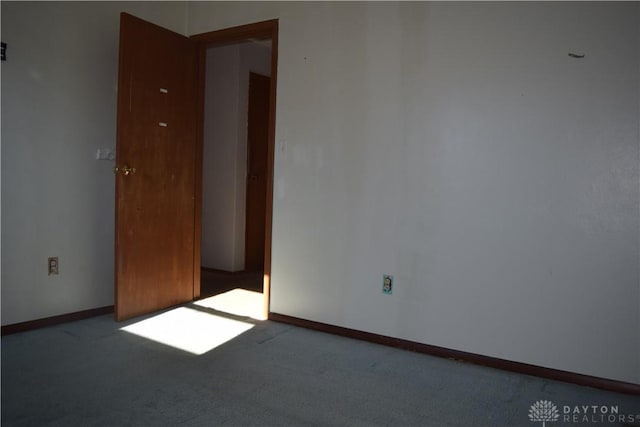 empty room featuring carpet floors