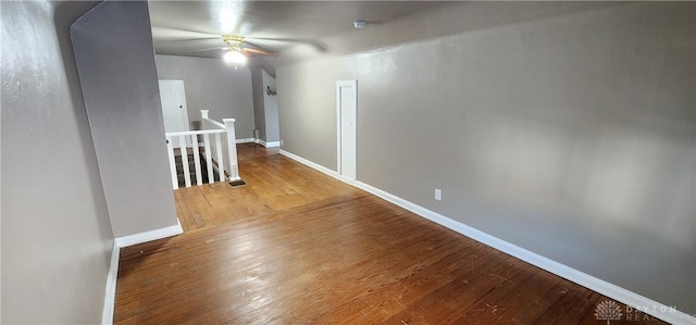 unfurnished room with wood-type flooring and ceiling fan