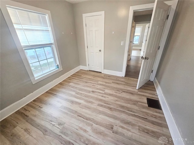 unfurnished bedroom featuring light hardwood / wood-style flooring