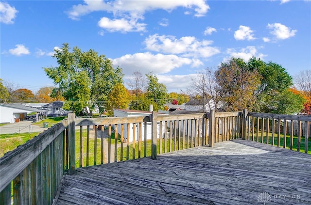 deck featuring a lawn