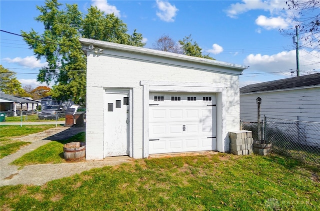 garage with a lawn