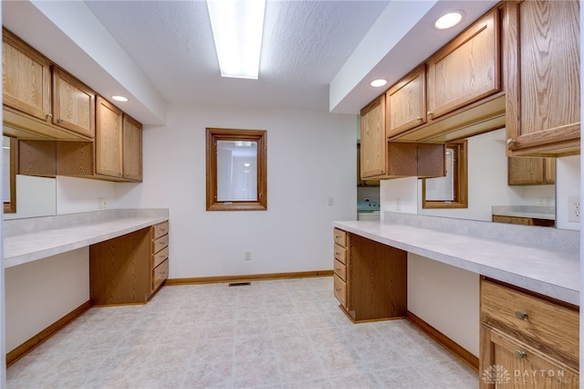 kitchen with a textured ceiling