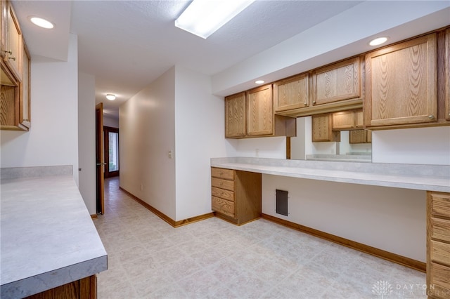 kitchen featuring built in desk