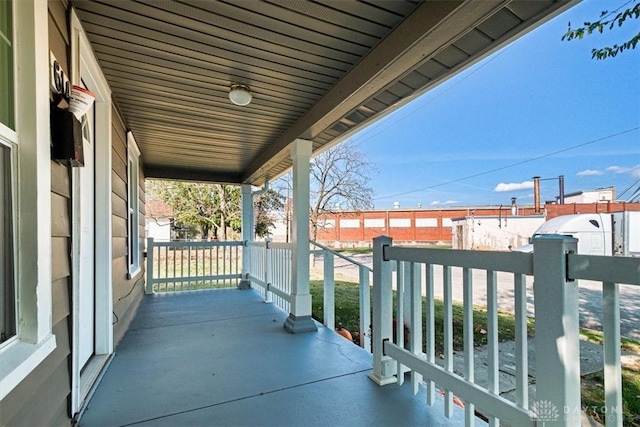 balcony featuring a porch