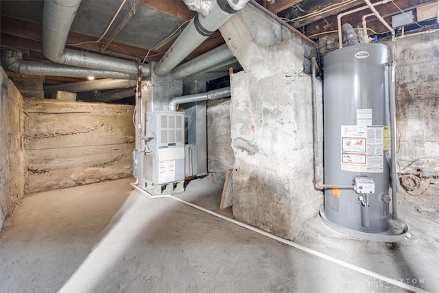 utility room featuring gas water heater