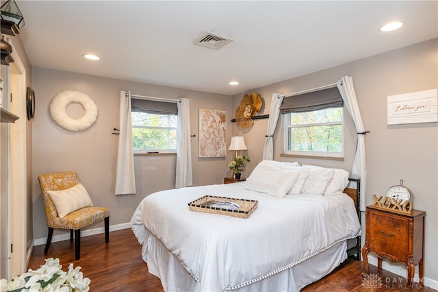 bedroom featuring dark hardwood / wood-style floors