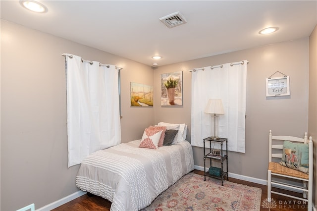 bedroom with hardwood / wood-style flooring