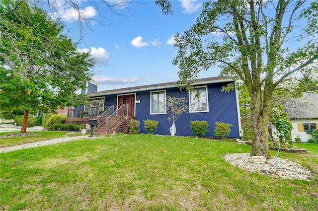 view of front facade with a front yard