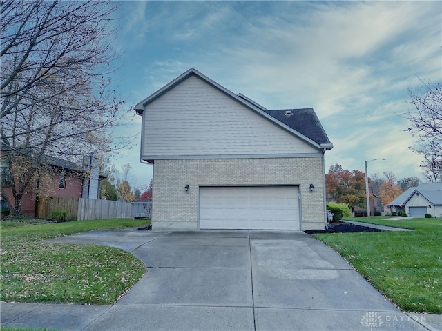 view of home's exterior with a lawn