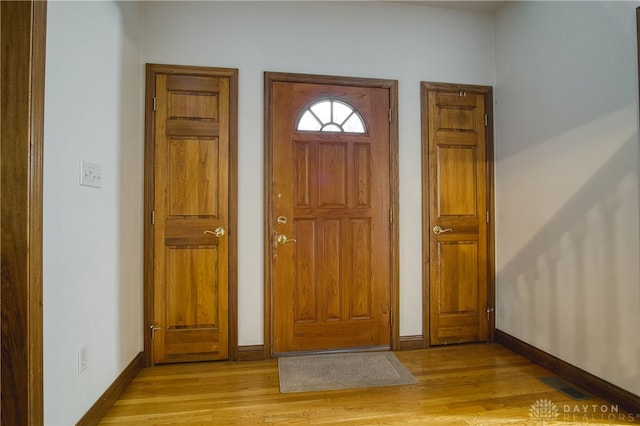 foyer entrance featuring light hardwood / wood-style floors