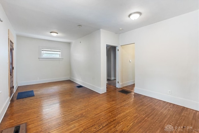 empty room featuring hardwood / wood-style floors