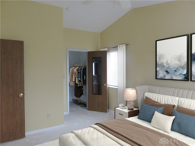 bedroom featuring a walk in closet, lofted ceiling, a closet, light colored carpet, and baseboards