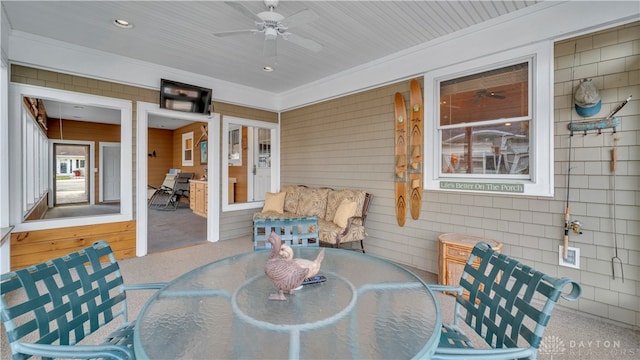 view of patio / terrace featuring ceiling fan