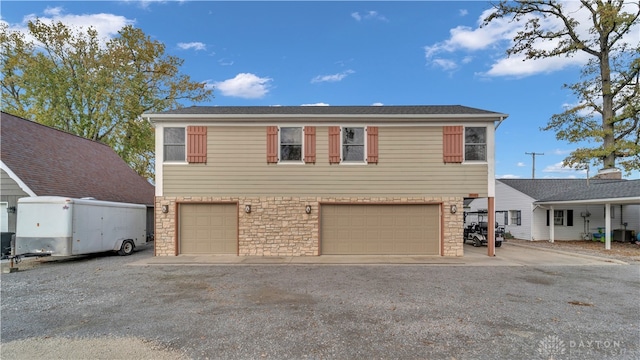 view of front of property featuring a garage