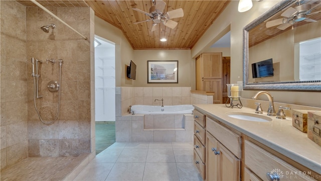 bathroom with vanity, ceiling fan, tile patterned floors, and shower with separate bathtub