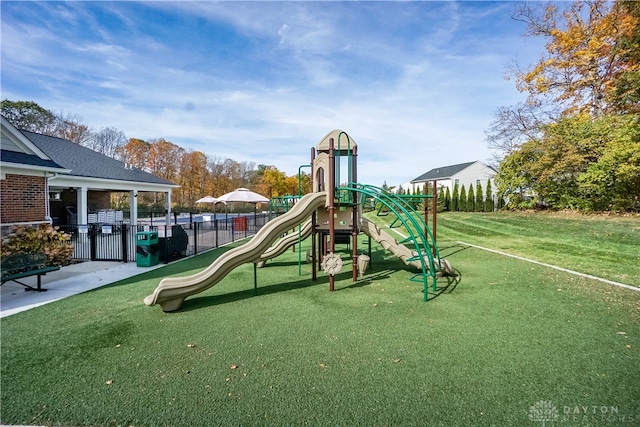 view of play area featuring a yard