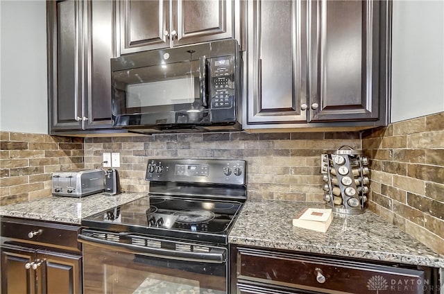 kitchen with backsplash, light stone countertops, dark brown cabinets, and black appliances