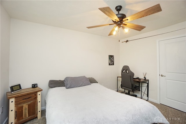 bedroom featuring ceiling fan and carpet floors