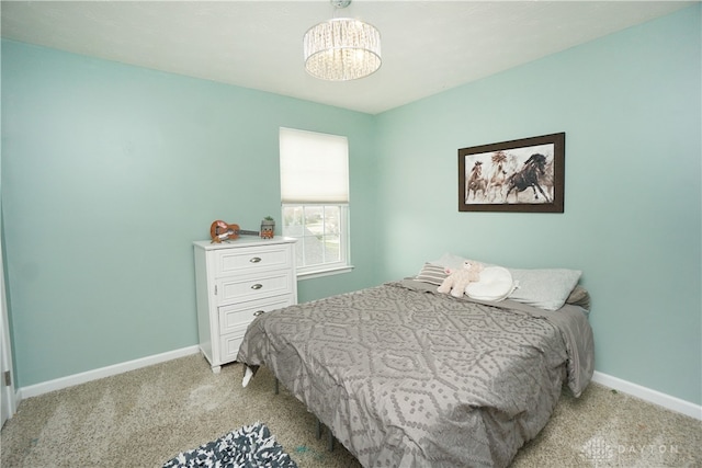 bedroom with light colored carpet