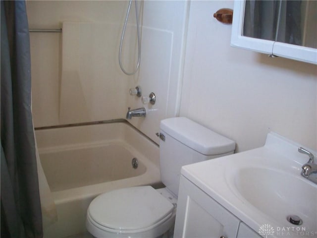 full bathroom featuring shower / bathtub combination with curtain, toilet, and vanity