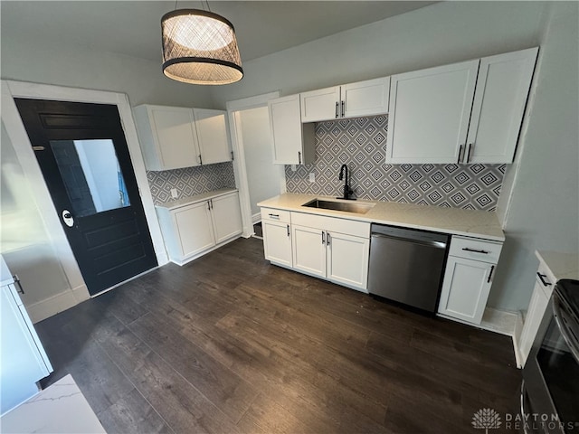 kitchen featuring dark wood-type flooring, white cabinetry, stainless steel appliances, and sink