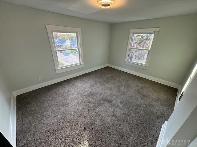 view of carpeted spare room