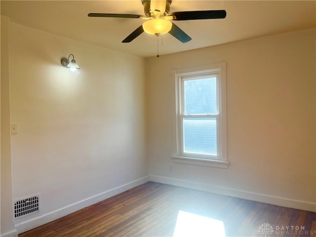 unfurnished room featuring ceiling fan and wood-type flooring