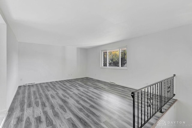 spare room featuring hardwood / wood-style floors