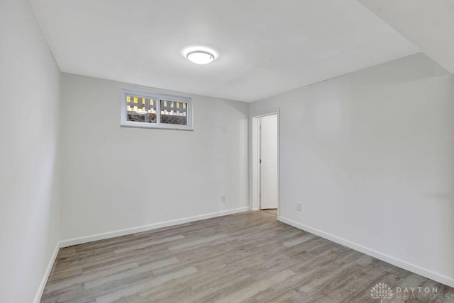 unfurnished room featuring light wood-type flooring