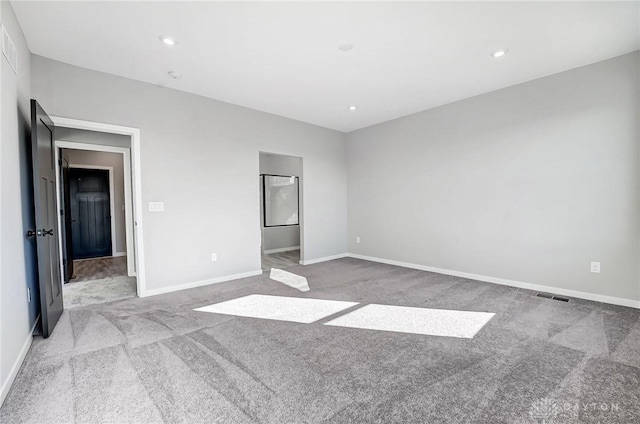 unfurnished bedroom with carpet, baseboards, and recessed lighting