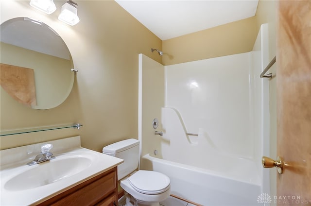 full bathroom featuring vanity,  shower combination, and toilet