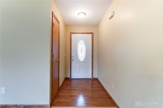 doorway to outside featuring hardwood / wood-style flooring