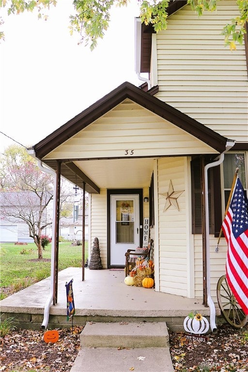 entrance to property with covered porch