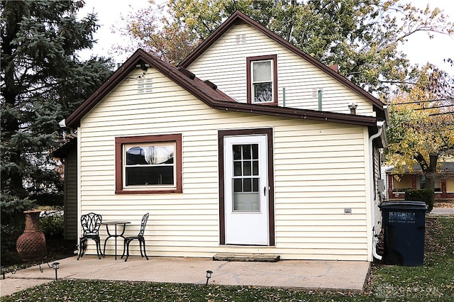 back of property featuring a patio area