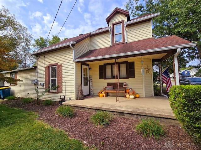 back of property with a patio area