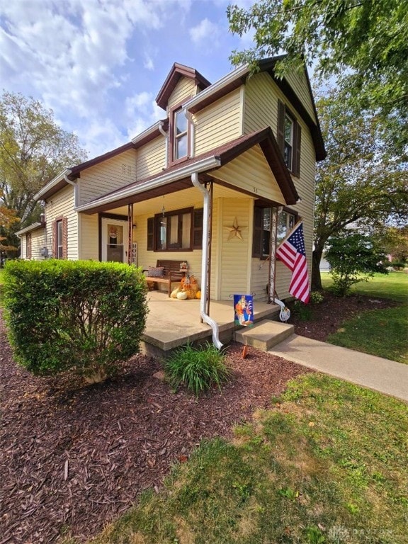 view of front of home featuring covered porch