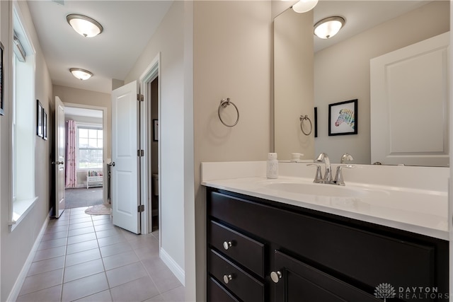 bathroom featuring vanity and tile patterned flooring