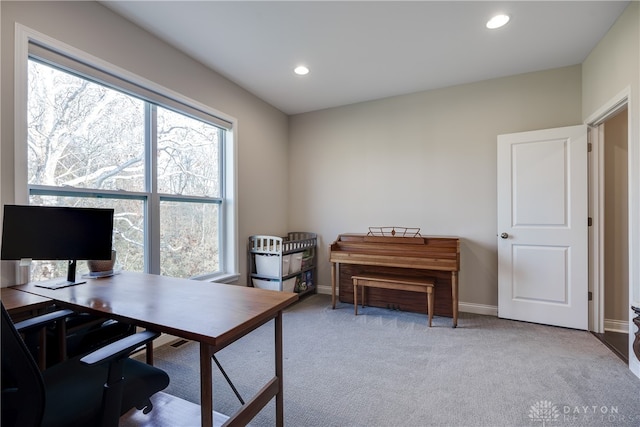 home office featuring light colored carpet