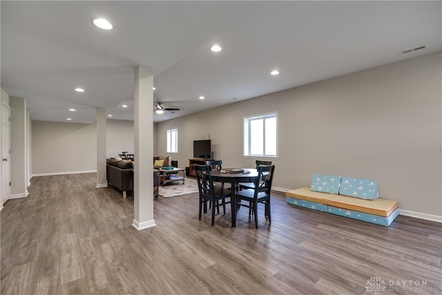 dining area featuring ceiling fan and light hardwood / wood-style flooring