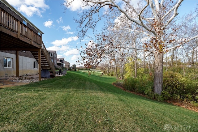 view of yard with a deck